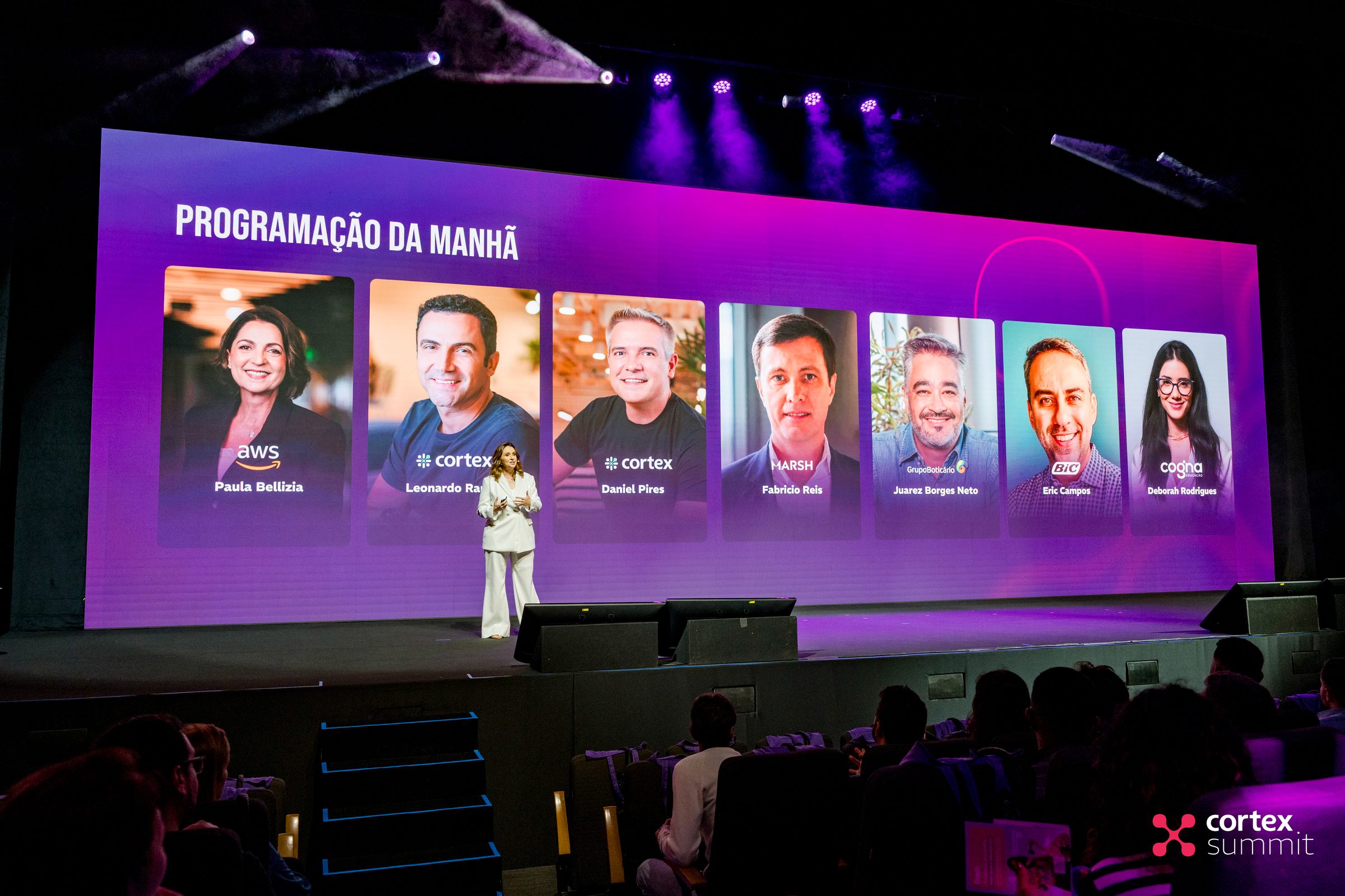 Main stage LED wall showing the morning program with the speaker lineup