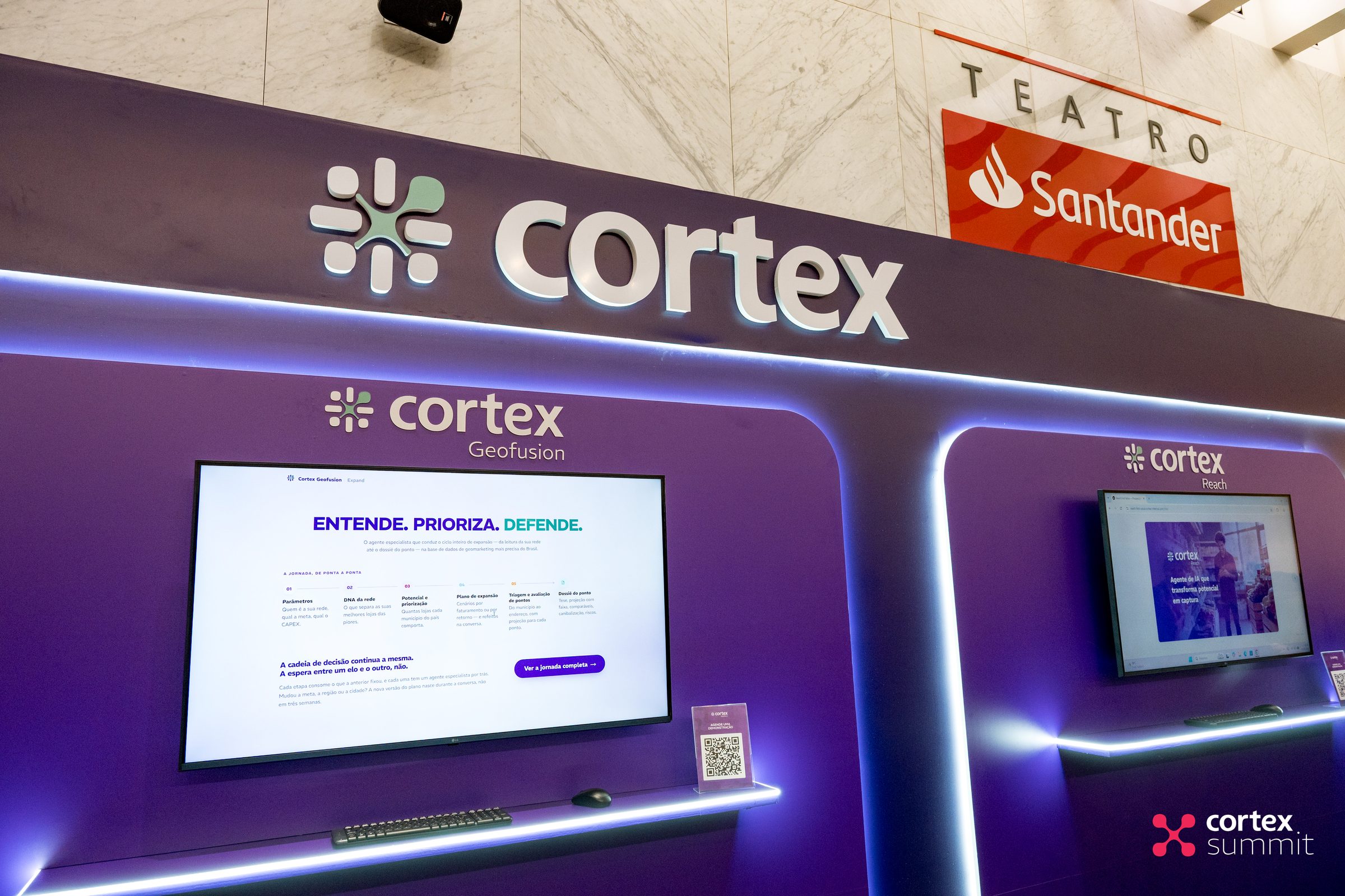 Cortex stand with purple walls, neon edges and product screens